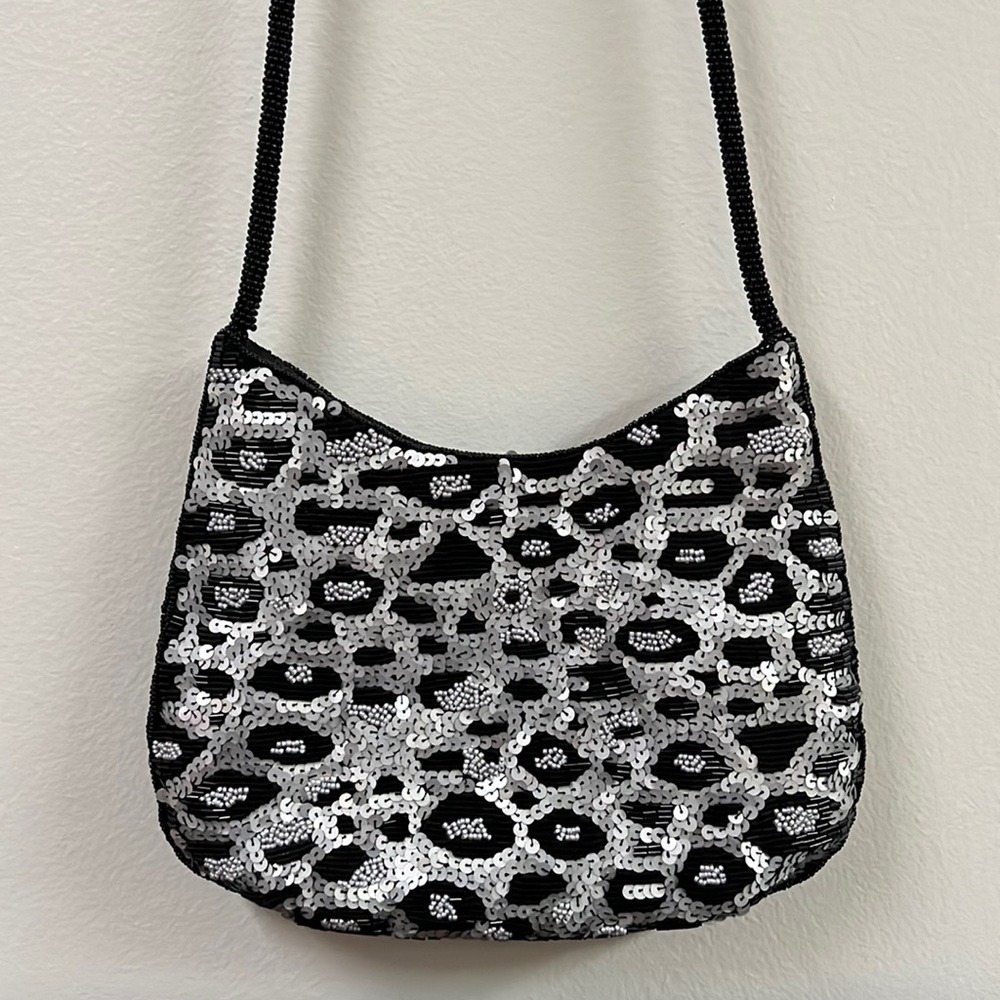 ▪️WHITTALL & SHON: Animal print sequin purse w/long beaded black rope strap▪️